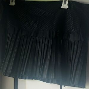 Pleated black mini skirt with black satin string